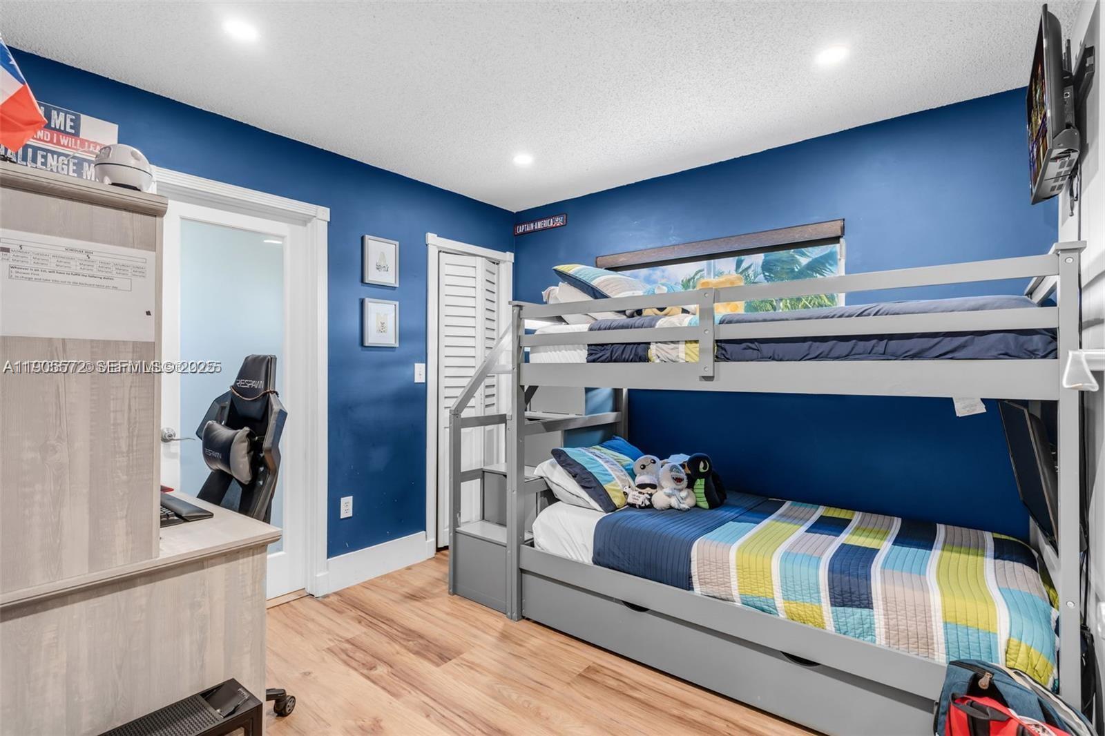 14206 Southwest 164th Terrace Miami, FL 33177 - Photo 21 of 58 a living room with furniture and a floor to ceiling window