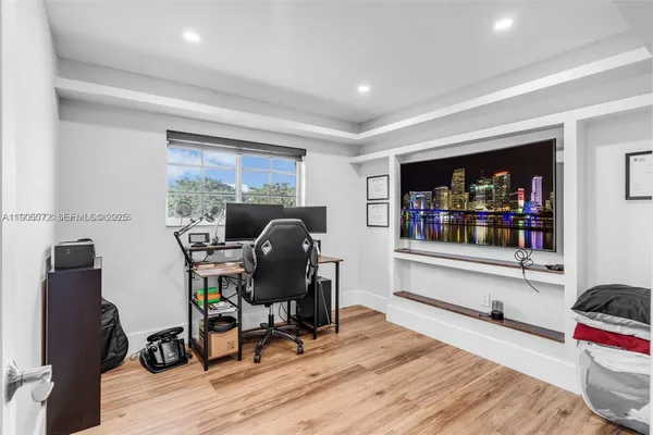 a bedroom with a bed and a cabinets