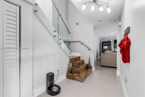 a view of entryway and livingroom