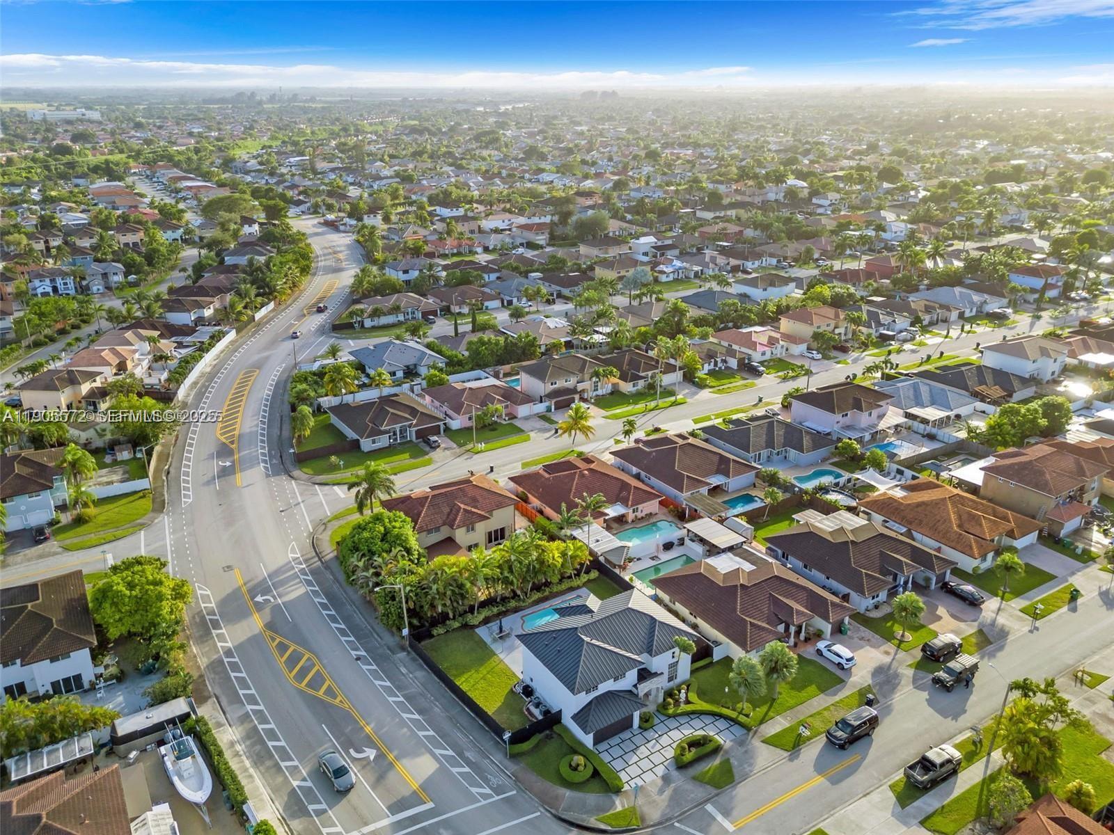 14206 Southwest 164th Terrace Miami, FL 33177 - Photo 56 of 58 an aerial view of residential houses with outdoor space