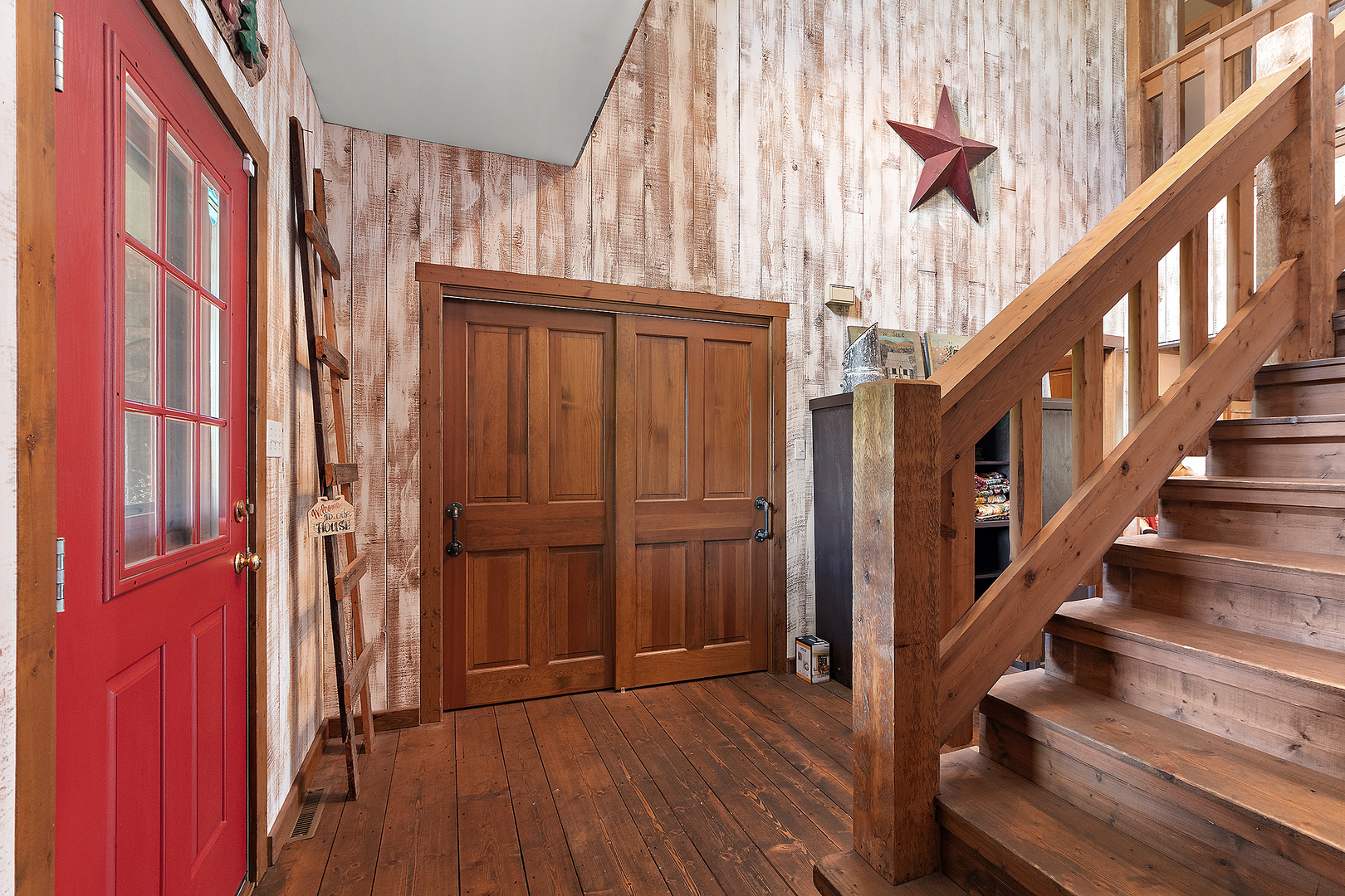 7860 West Steger Road Frankfort, IL 60423 - Photo 8 of 56 a view of an entryway with wooden floor and stairs