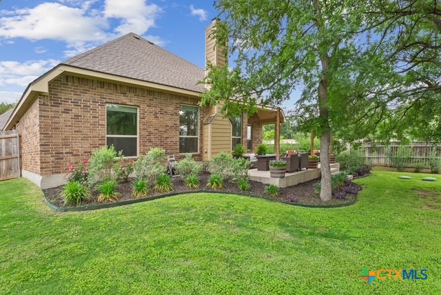 3306 Spring Canyon Road Belton, TX 76513 - Photo 37 of 40 a view of a house with backyard and sitting area