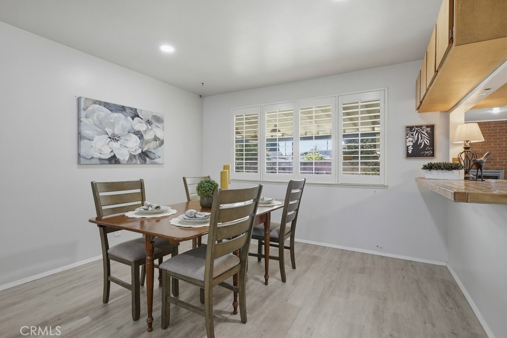 11681 Wasco Road Garden Grove, CA 92841 - Photo 11 of 58 a view of a dining room with furniture window and outside view