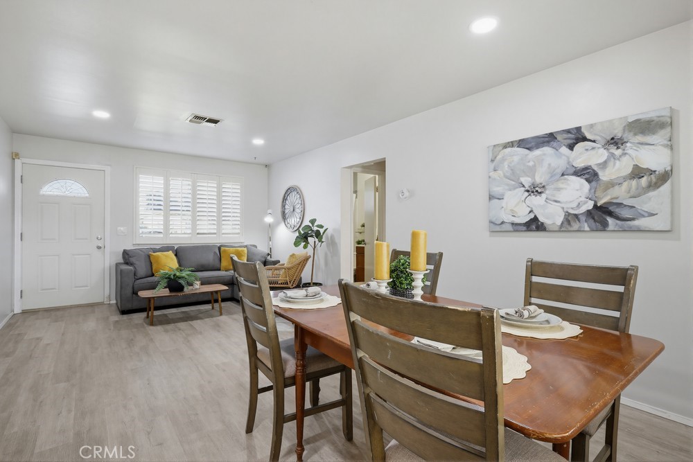 11681 Wasco Road Garden Grove, CA 92841 - Photo 12 of 58 a living room with furniture and wooden floor