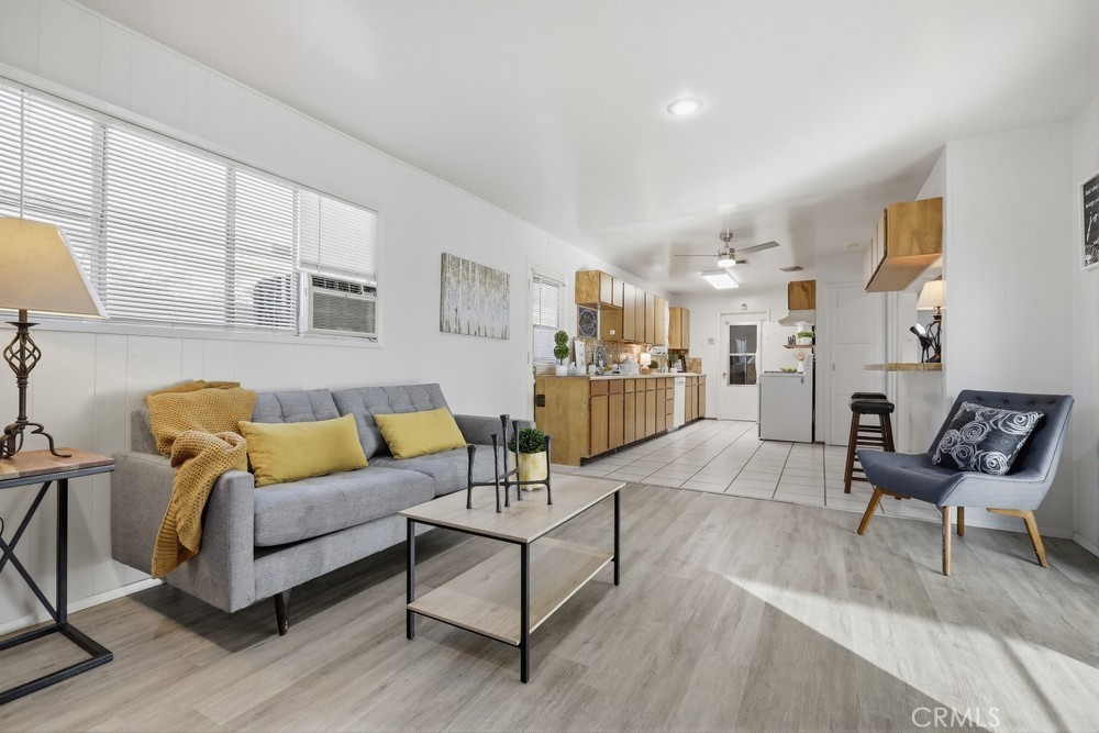 11681 Wasco Road Garden Grove, CA 92841 - Photo 29 of 58 a living room with furniture and a table