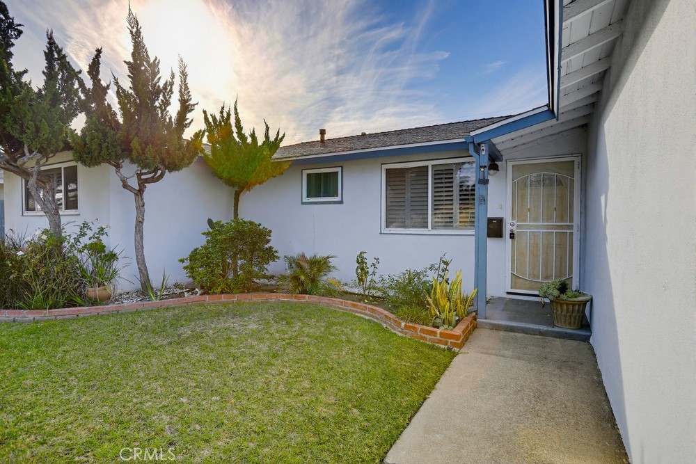 11681 Wasco Road Garden Grove, CA 92841 - Photo 4 of 58 a front view of a house with a yard