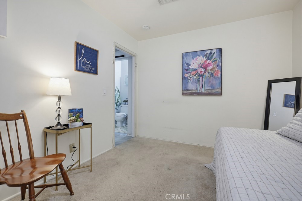 11681 Wasco Road Garden Grove, CA 92841 - Photo 45 of 58 a view of a workspace with furniture and a lamp