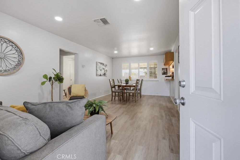 11681 Wasco Road Garden Grove, CA 92841 - Photo 5 of 58 a living room with furniture and wooden floor