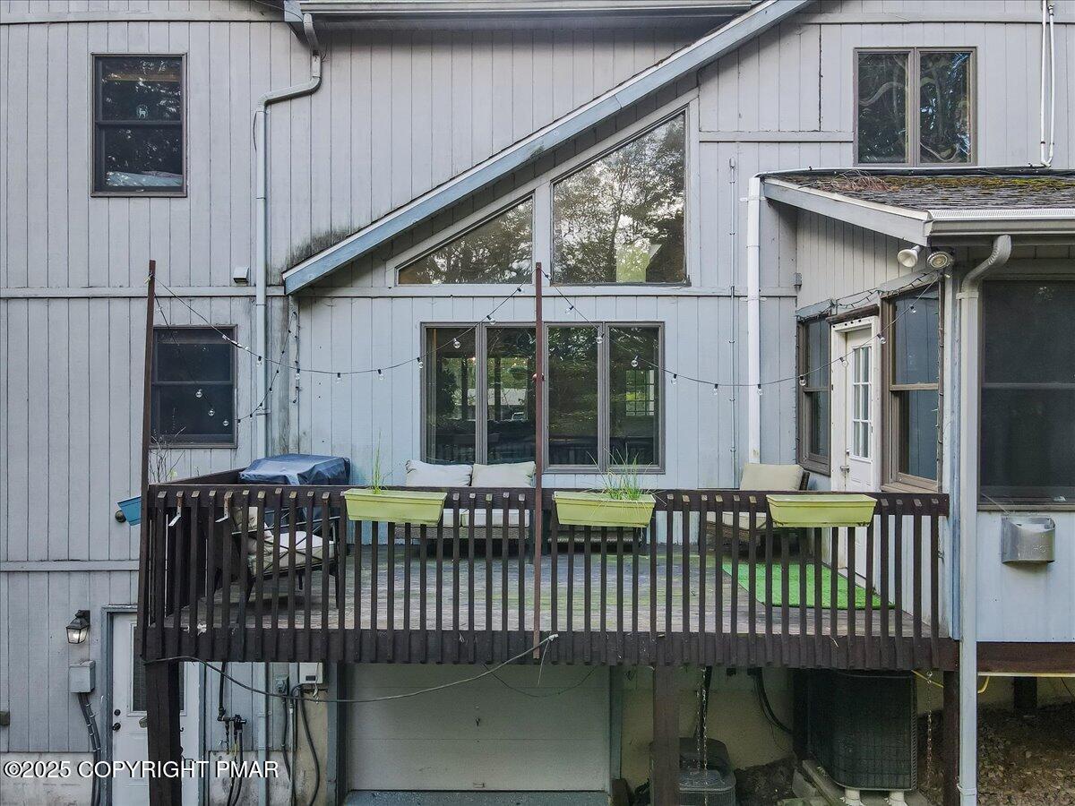 74 Split Rock Road Lake Harmony, PA 18624 - Photo 62 of 77 a view of a house with a wooden deck