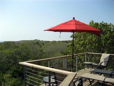6 Cooper Circle Truro, MA 02666 - Photo 16 of 24 a view of a deck with mountain view and wooden floor