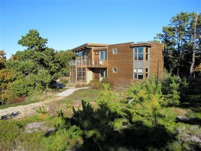 6 Cooper Circle Truro, MA 02666 - Photo 2 of 24 a view of a house with a yard