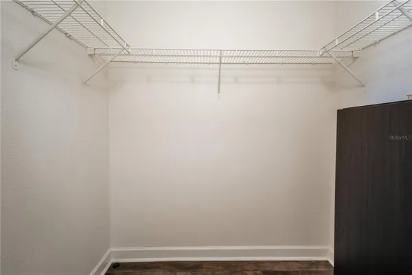 a view of a room with racks on the wall