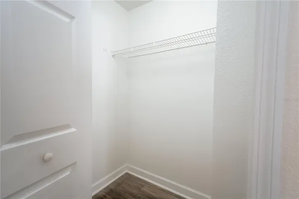 a view of small space with racks on the wall