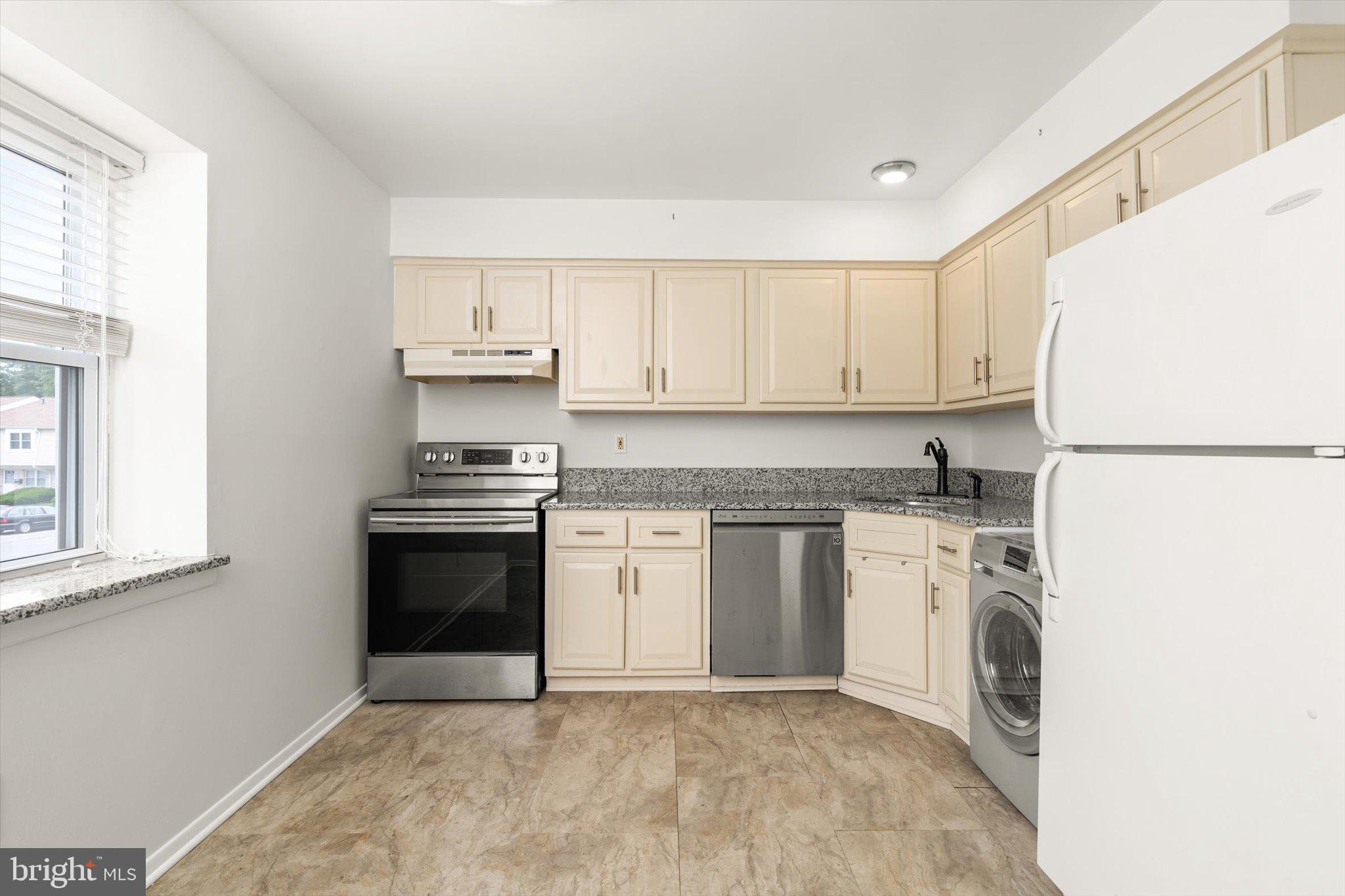 201 Silver Court Hamilton, NJ 08690 - Photo 16 of 27 a kitchen with a refrigerator stove and sink