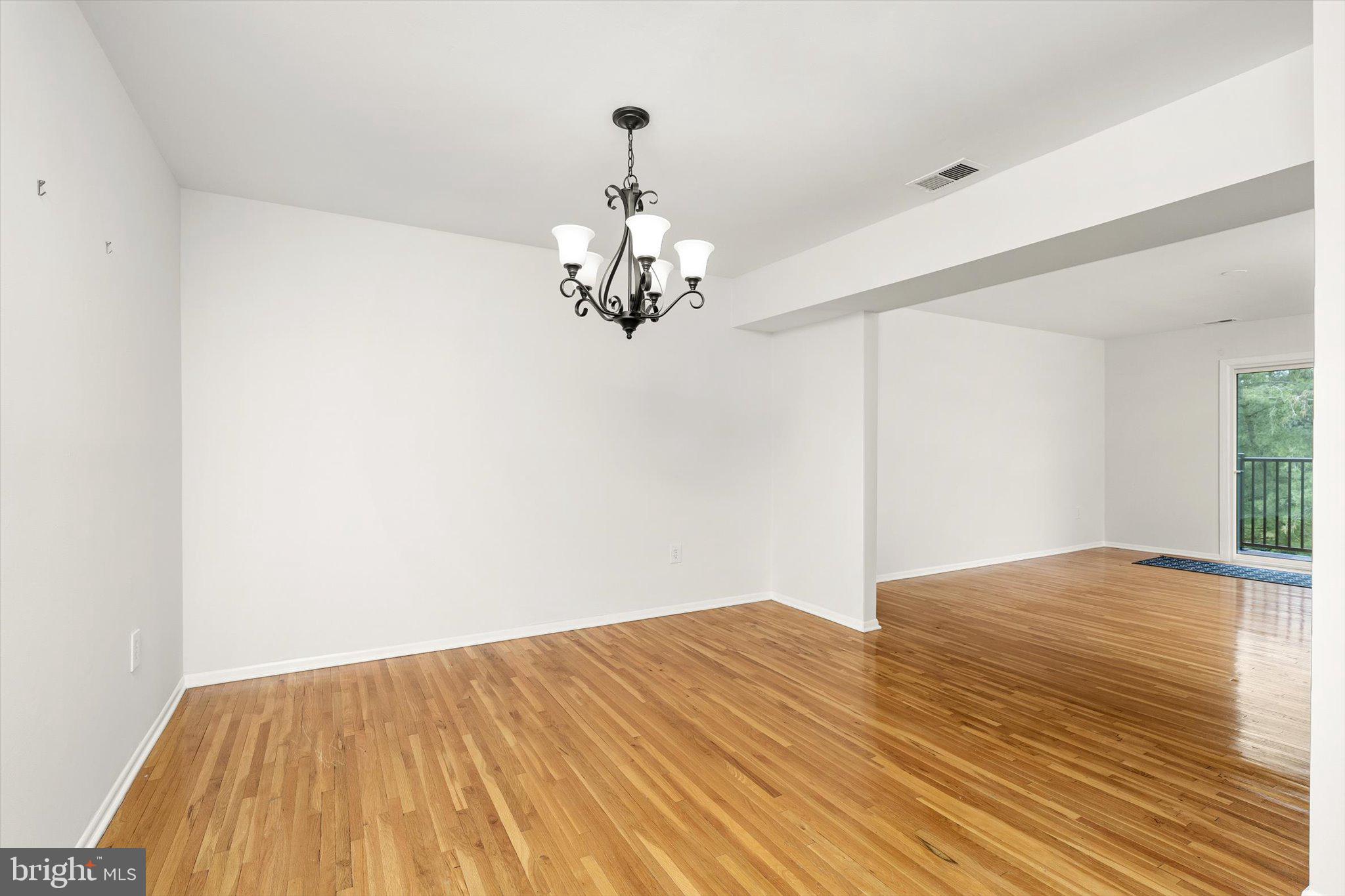 201 Silver Court Hamilton, NJ 08690 - Photo 20 of 27 a view of empty room with wooden floor