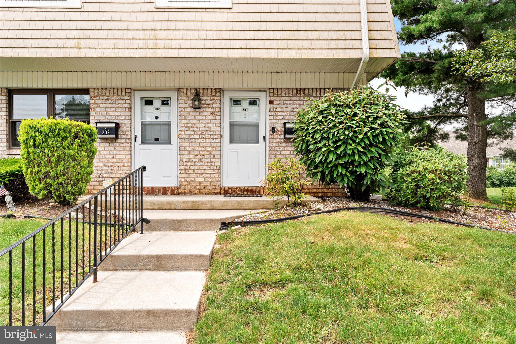 201 Silver Court Hamilton, NJ 08690 - Photo 2 of 27 a view of a house with backyard and sitting area