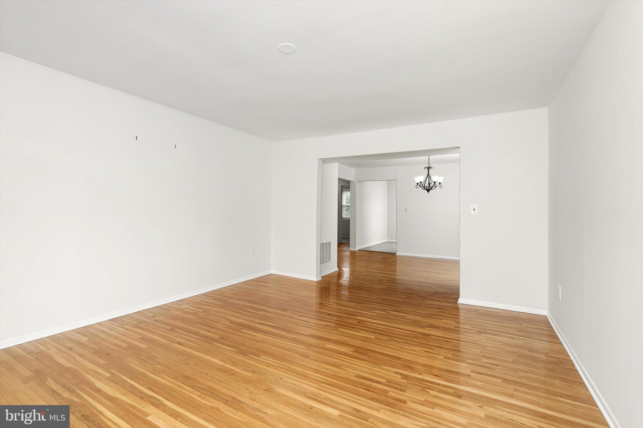 201 Silver Court Hamilton, NJ 08690 - Photo 24 of 27 a view of empty room with wooden floor