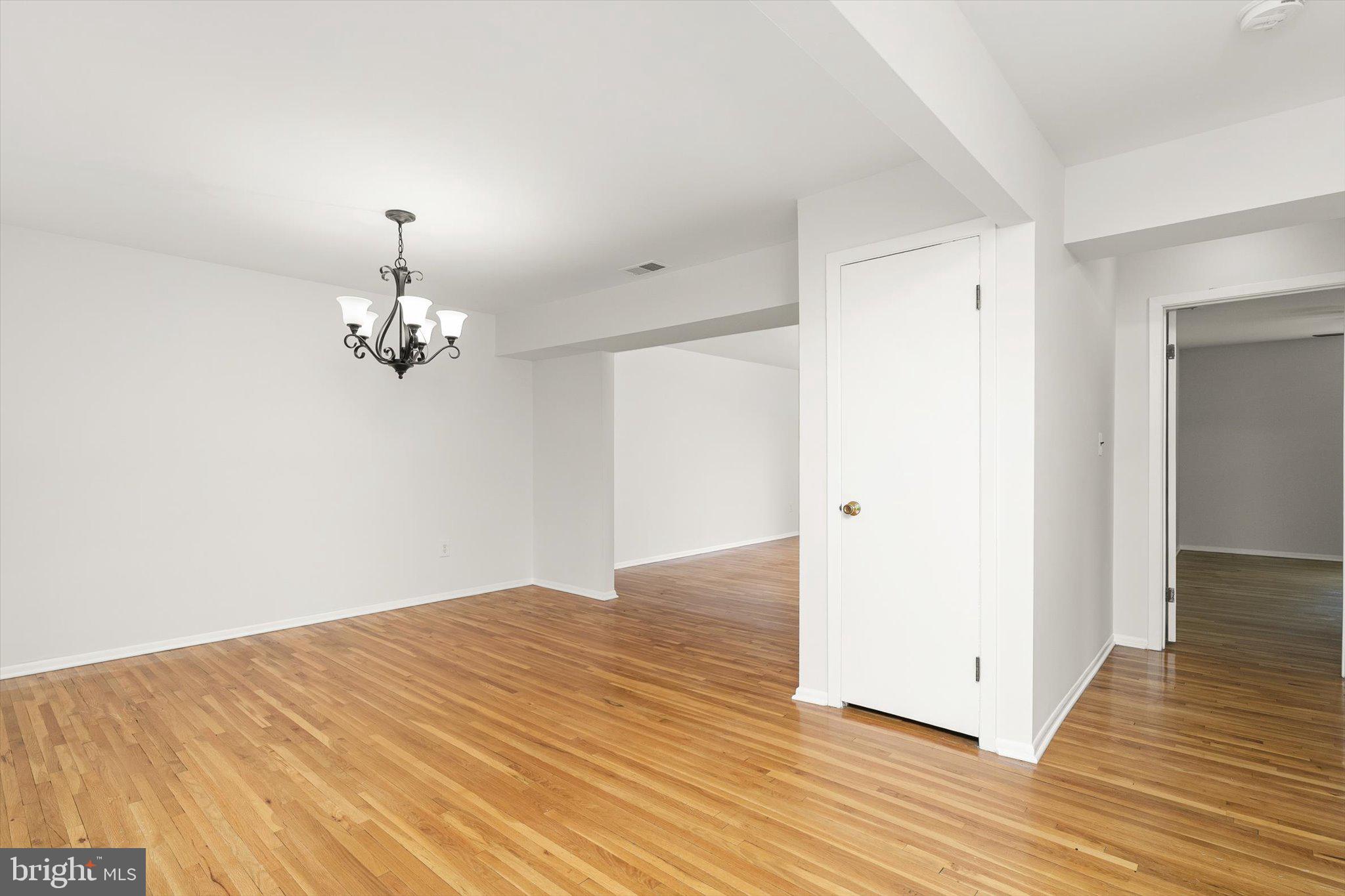 201 Silver Court Hamilton, NJ 08690 - Photo 26 of 27 a view of empty room with wooden floor
