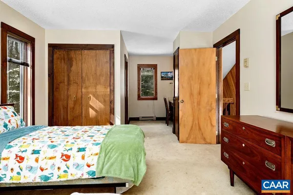 a view of backyard with wheel chair and potted plants