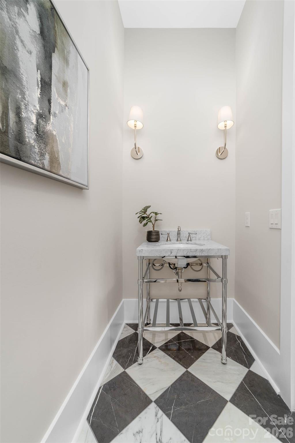 216 Walnut Street Davidson, NC 28036 - Photo 17 of 48 a room with a table and a mirror