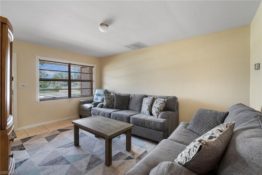 18565 Sebring Road Fort Myers, FL 33967 - Photo 5 of 23 a living room with furniture and a window
