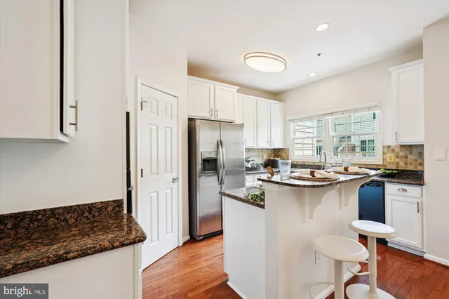 a bedroom with bed and a window