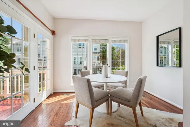 a bathroom with a bathtub a sink and a window