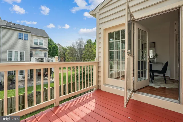 a bathroom with a granite countertop sink shower mirror and a
