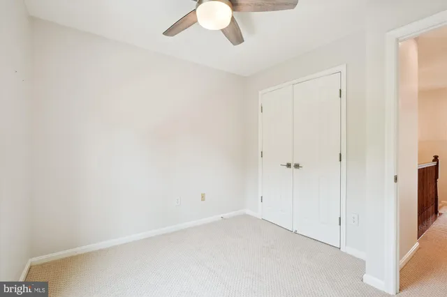 a view of a house with a yard patio and sitting area