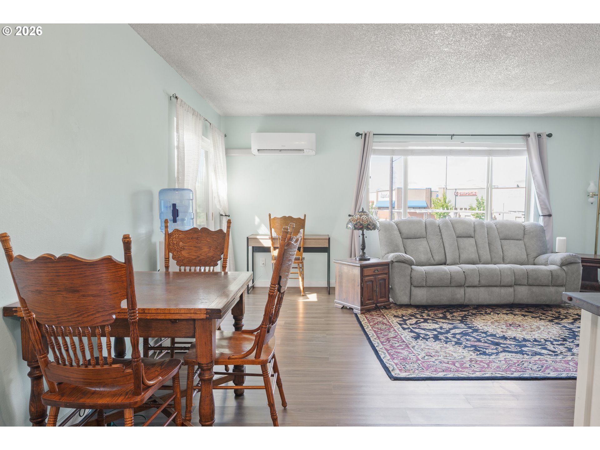 2727 Gateway Street, Unit 18 Springfield, OR 97477 - Photo 15 of 34 a living room with furniture and a window