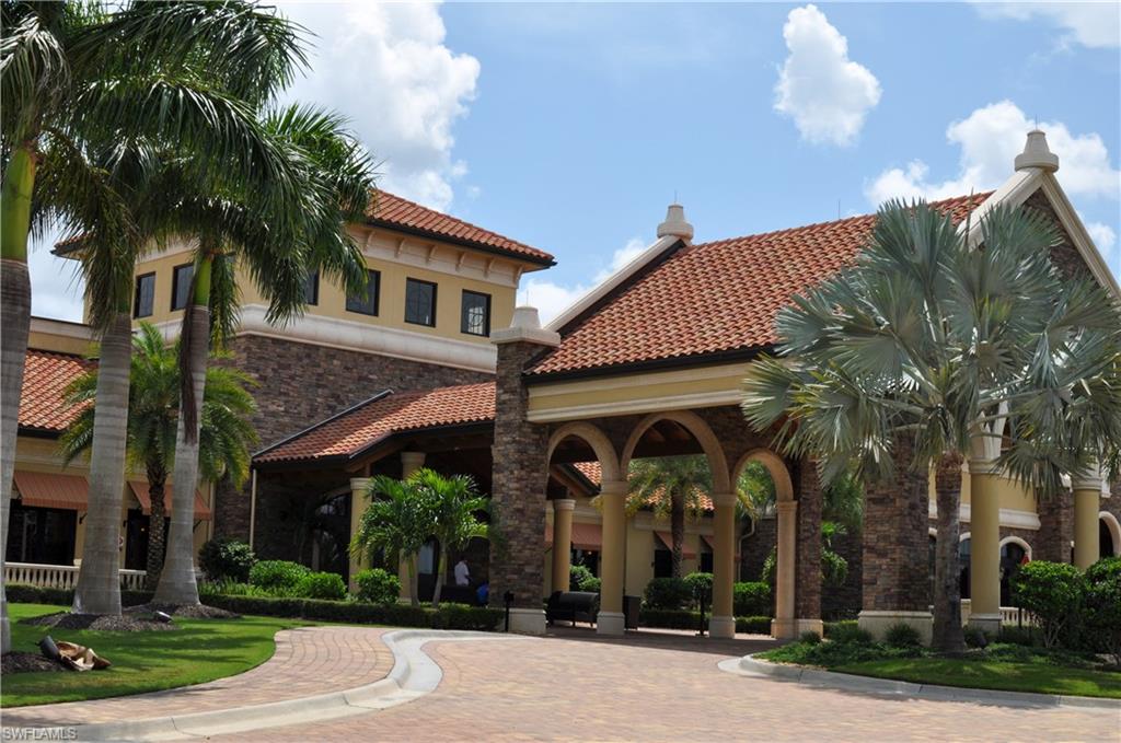 9529 Avellino Way, Unit 2823 Naples, FL 34113 - Photo 19 of 25 a front view of a house with garden