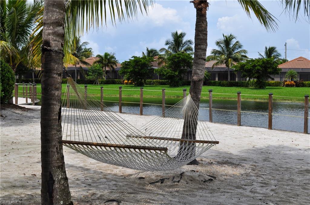 9529 Avellino Way, Unit 2823 Naples, FL 34113 - Photo 24 of 25 a view of a park with iron fence