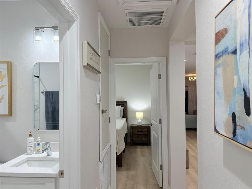 10336 Pendleton Avenue Englewood, FL 34224 - Photo 12 of 12 a en suite bathroom with a sink and a mirror