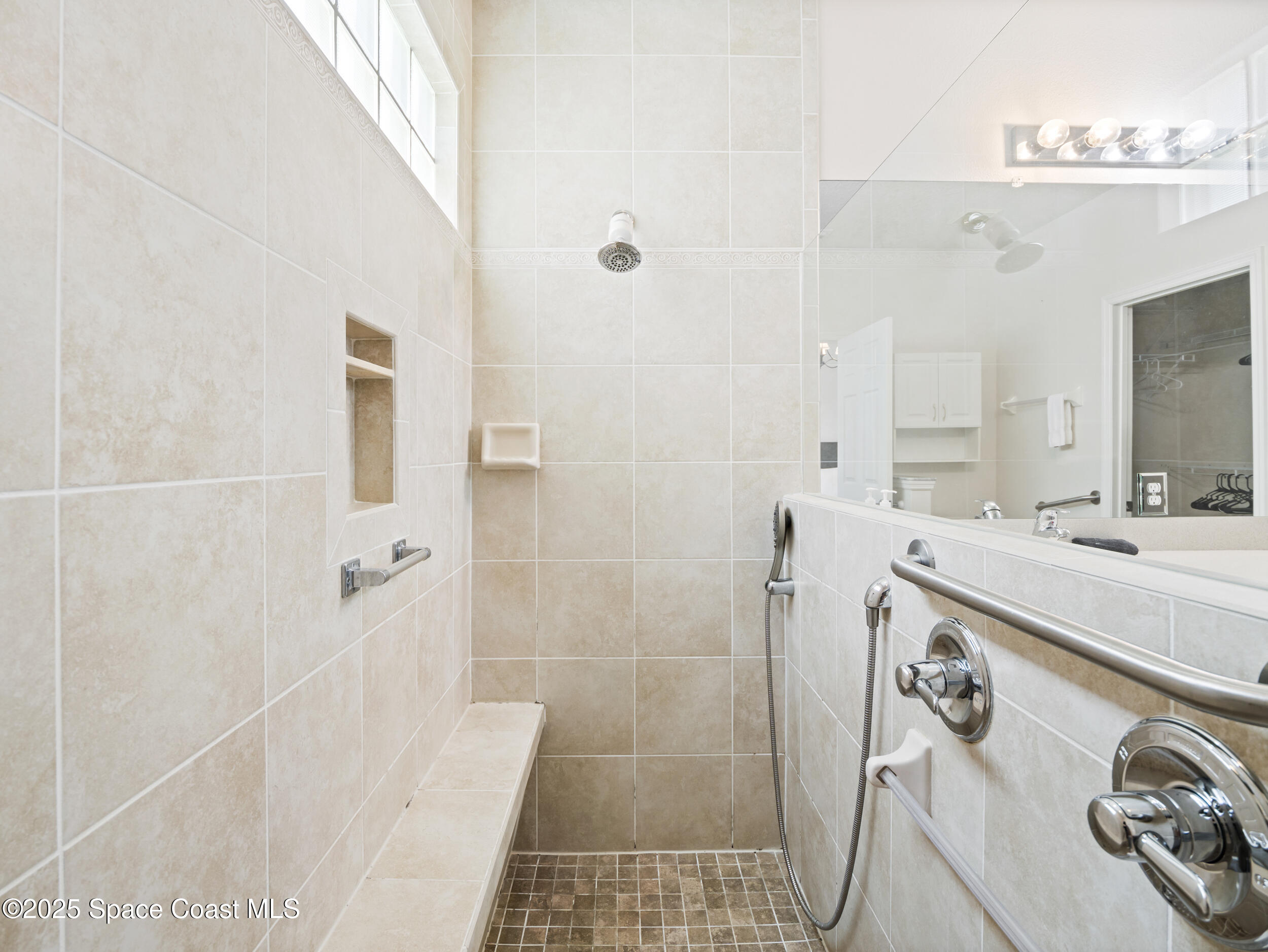 1214 Bolle Circle Rockledge, FL 32955 - Photo 19 of 27 a bathroom with a sink and a mirror