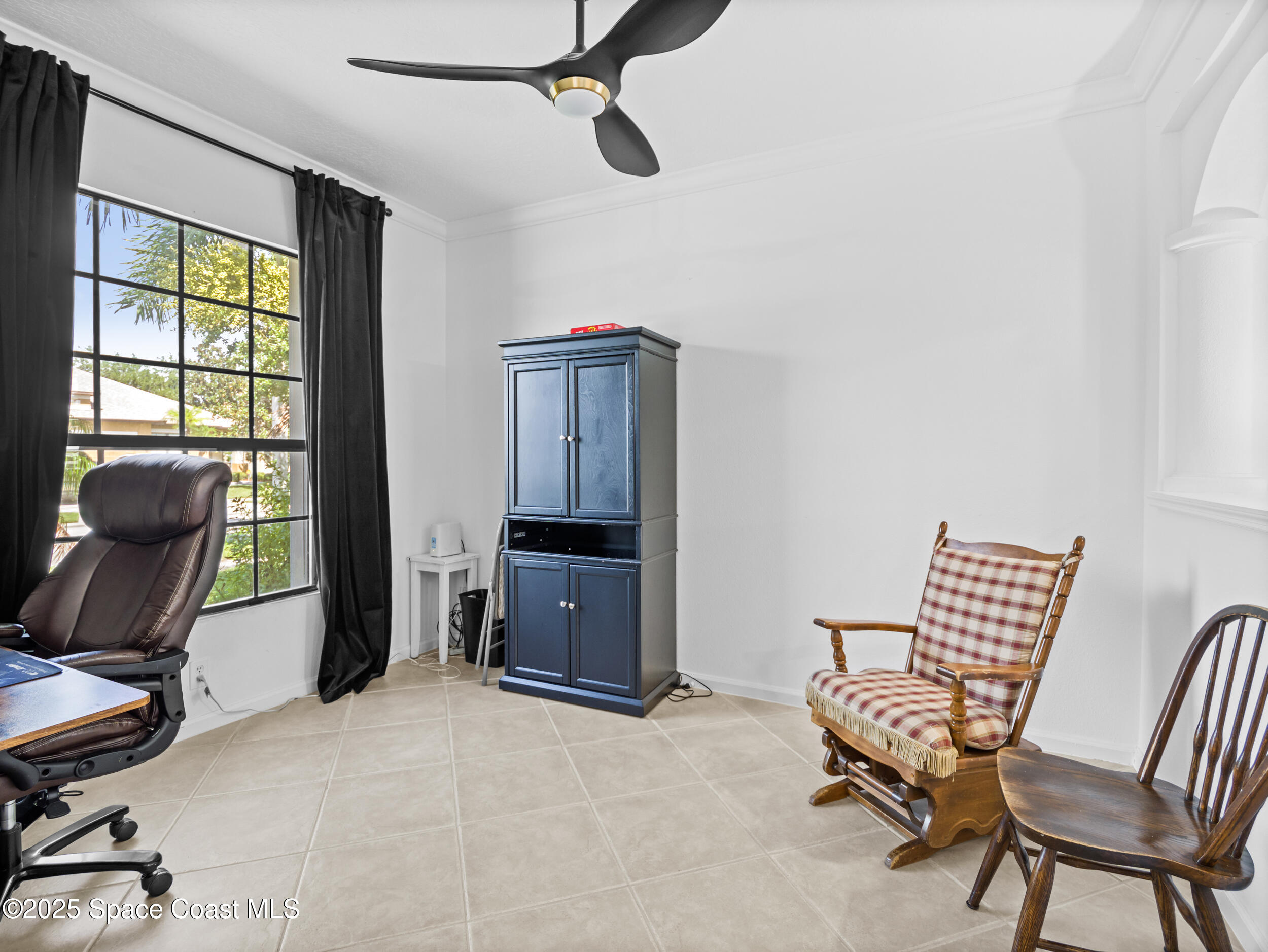 1214 Bolle Circle Rockledge, FL 32955 - Photo 4 of 27 a view of workspace with furniture and windows