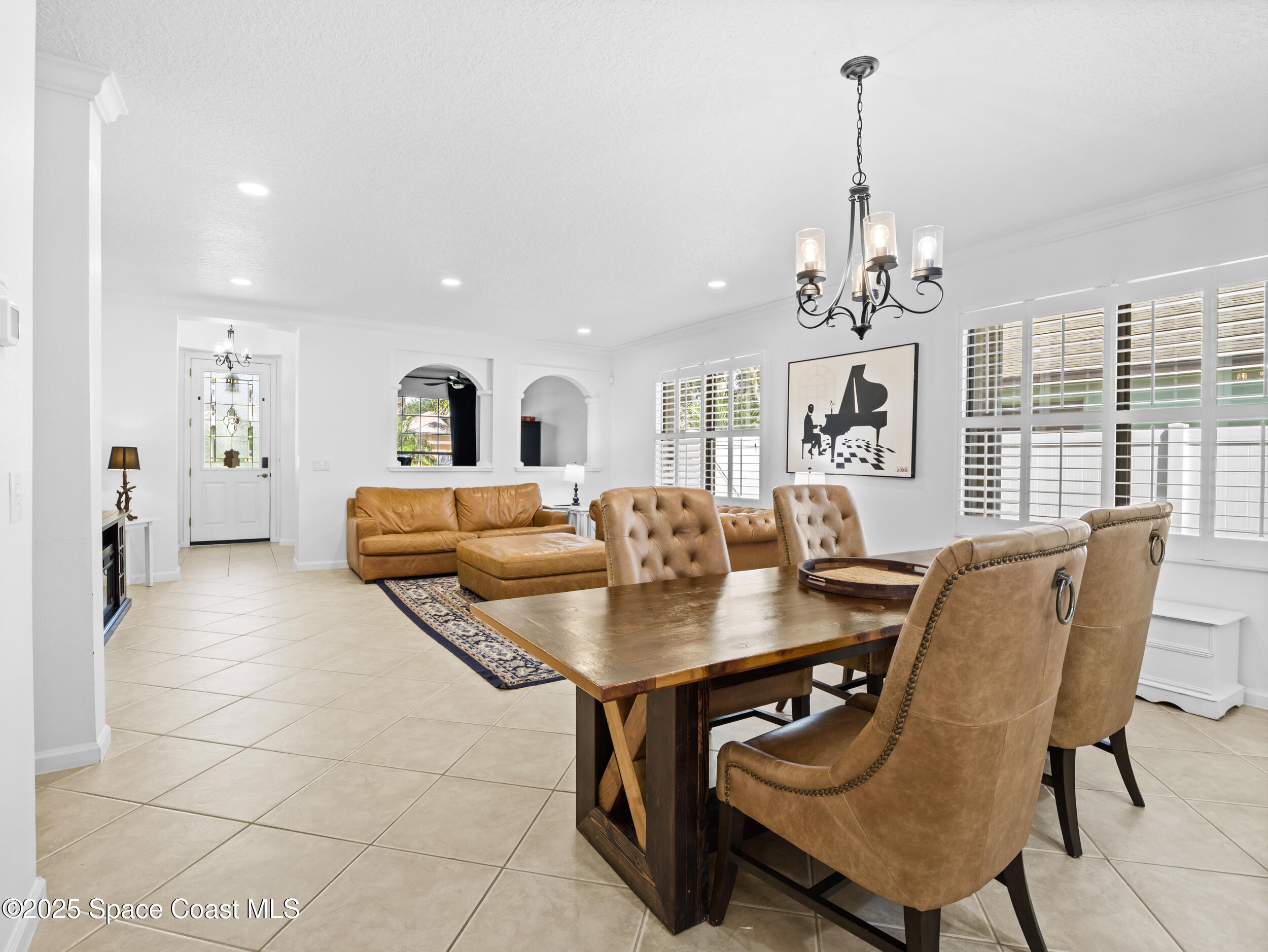 1214 Bolle Circle Rockledge, FL 32955 - Photo 6 of 27 a view of a dining room with furniture