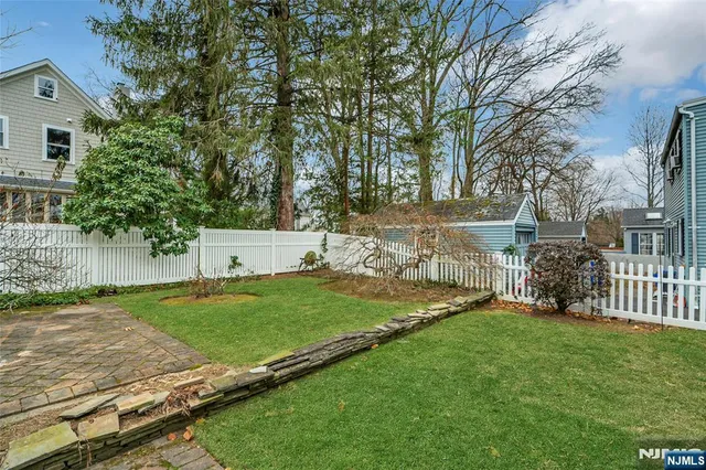 a view of a backyard with a garden