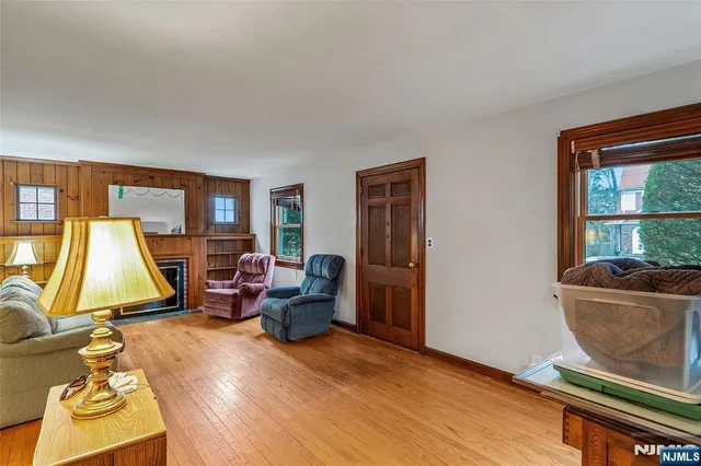 a living room with a couch and a window