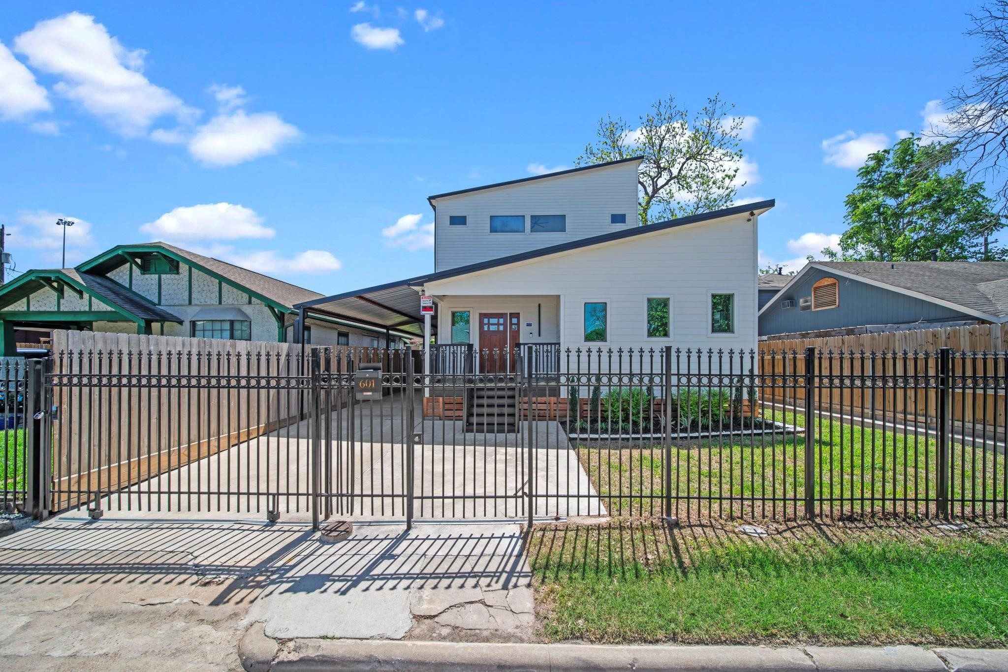 601 Cottage Street Houston, TX 77009 - Photo 4 of 48 Gated entrance on this 3 story beauty. Wait until you get inside. Be prepared to be impressed.