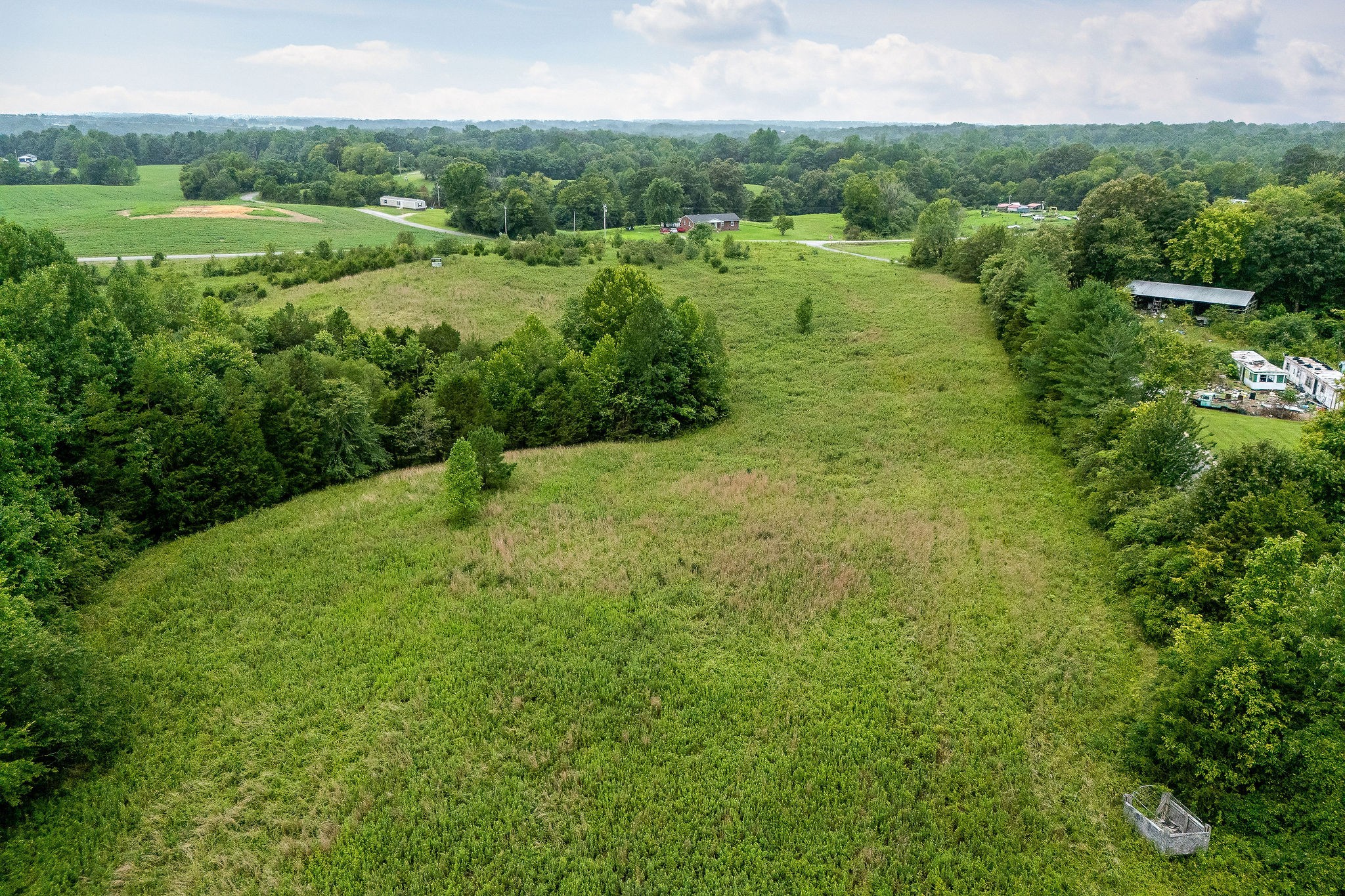 0 Four 4 Seasons Road Smithville, TN 37166 - Photo 11 of 17 a view of a lush green outdoor space with a lake view