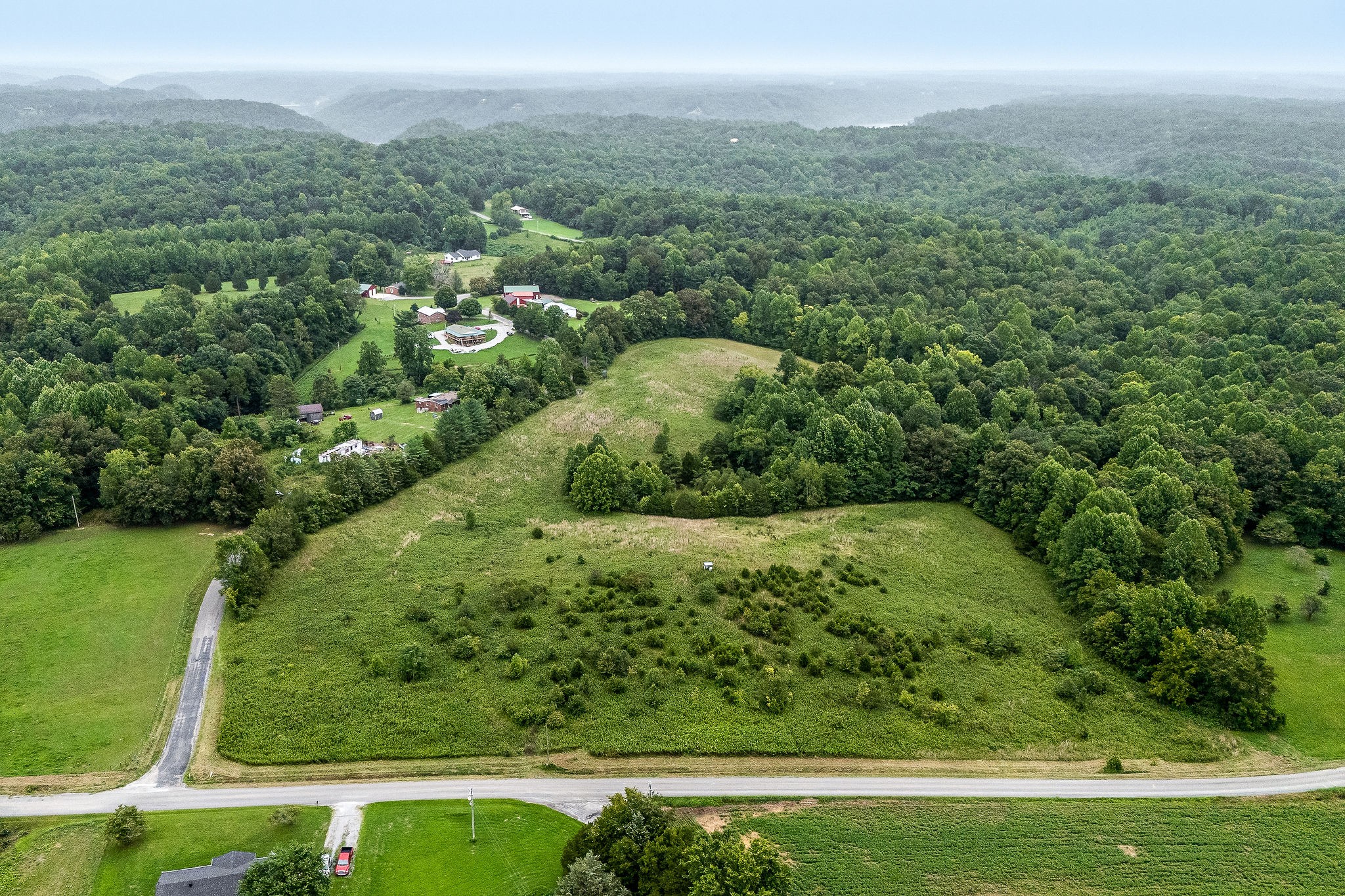 0 Four 4 Seasons Road Smithville, TN 37166 - Photo 13 of 17 a view of a green yard with an outdoor seating