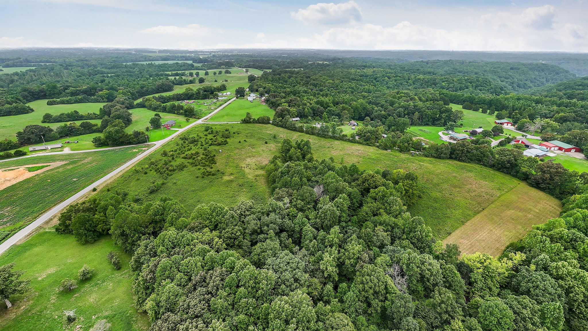 0 Four 4 Seasons Road Smithville, TN 37166 - Photo 6 of 17 an aerial view of residential houses with outdoor space and trees