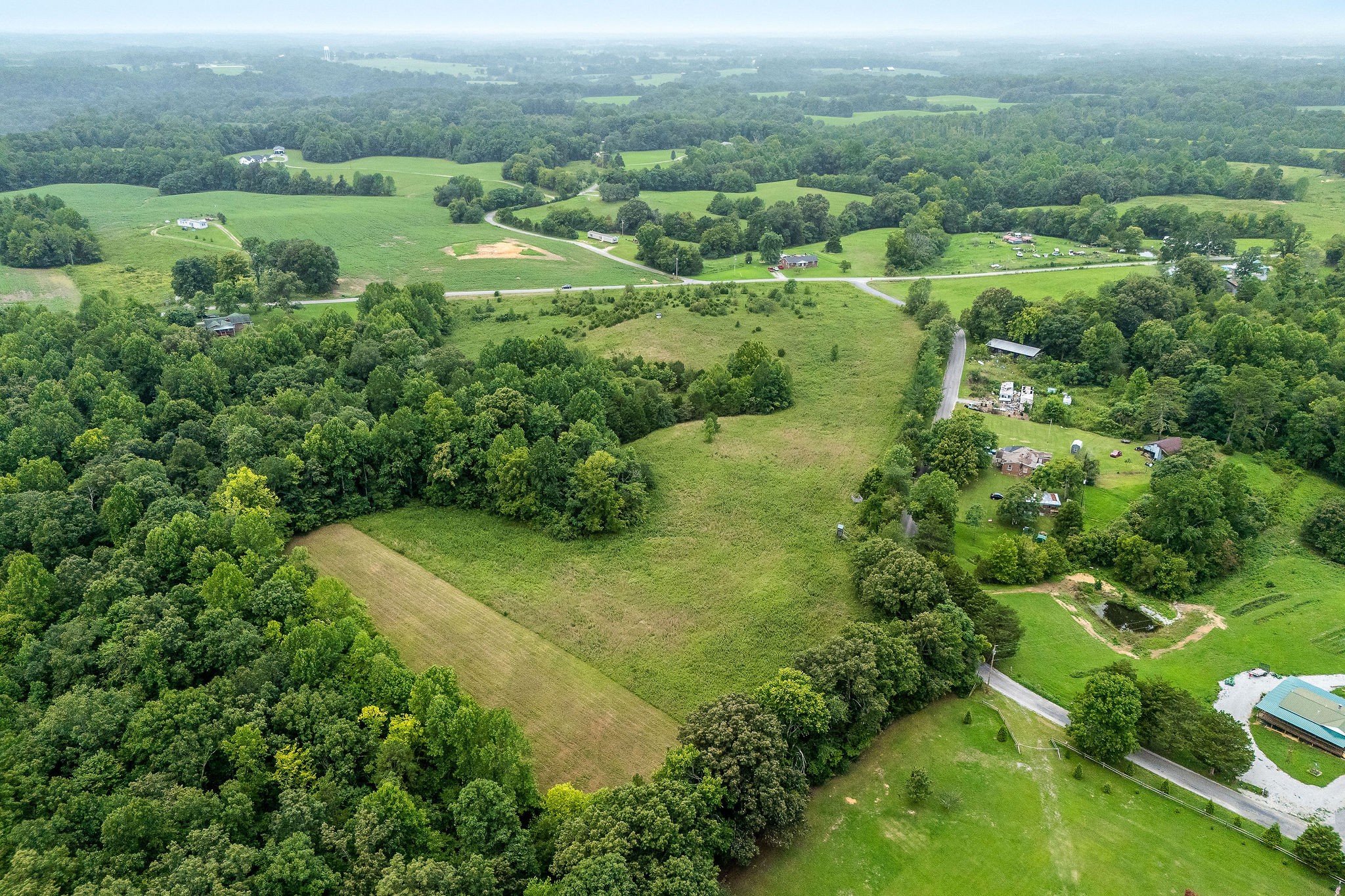 0 Four 4 Seasons Road Smithville, TN 37166 - Photo 8 of 17 an aerial view of residential houses with outdoor space and trees