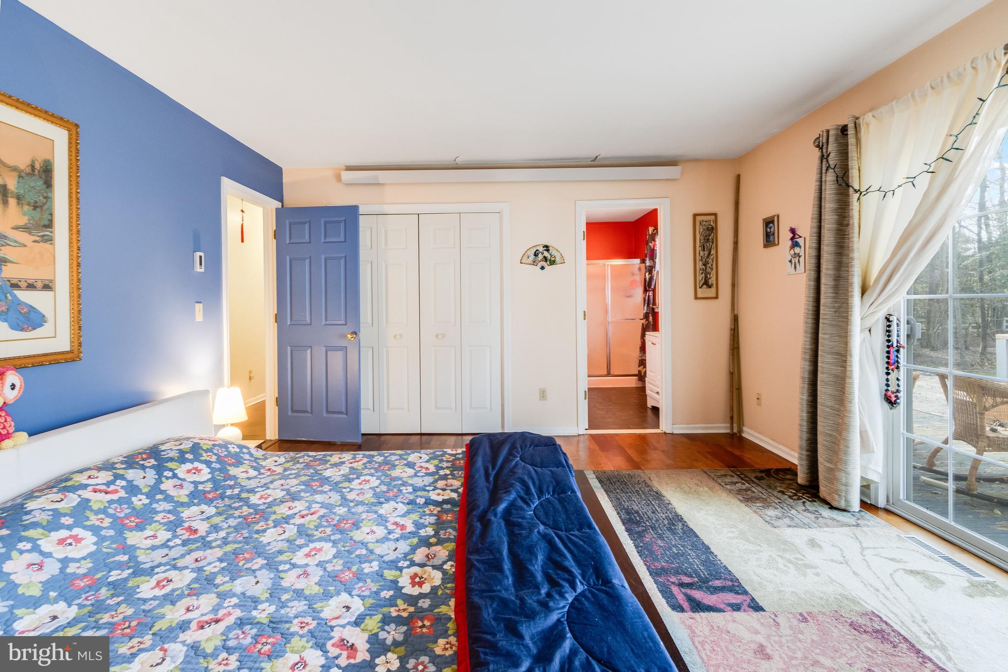 116 Red Cedar Drive Milton, DE 19968 - Photo 23 of 44 a bedroom with a bed and a window