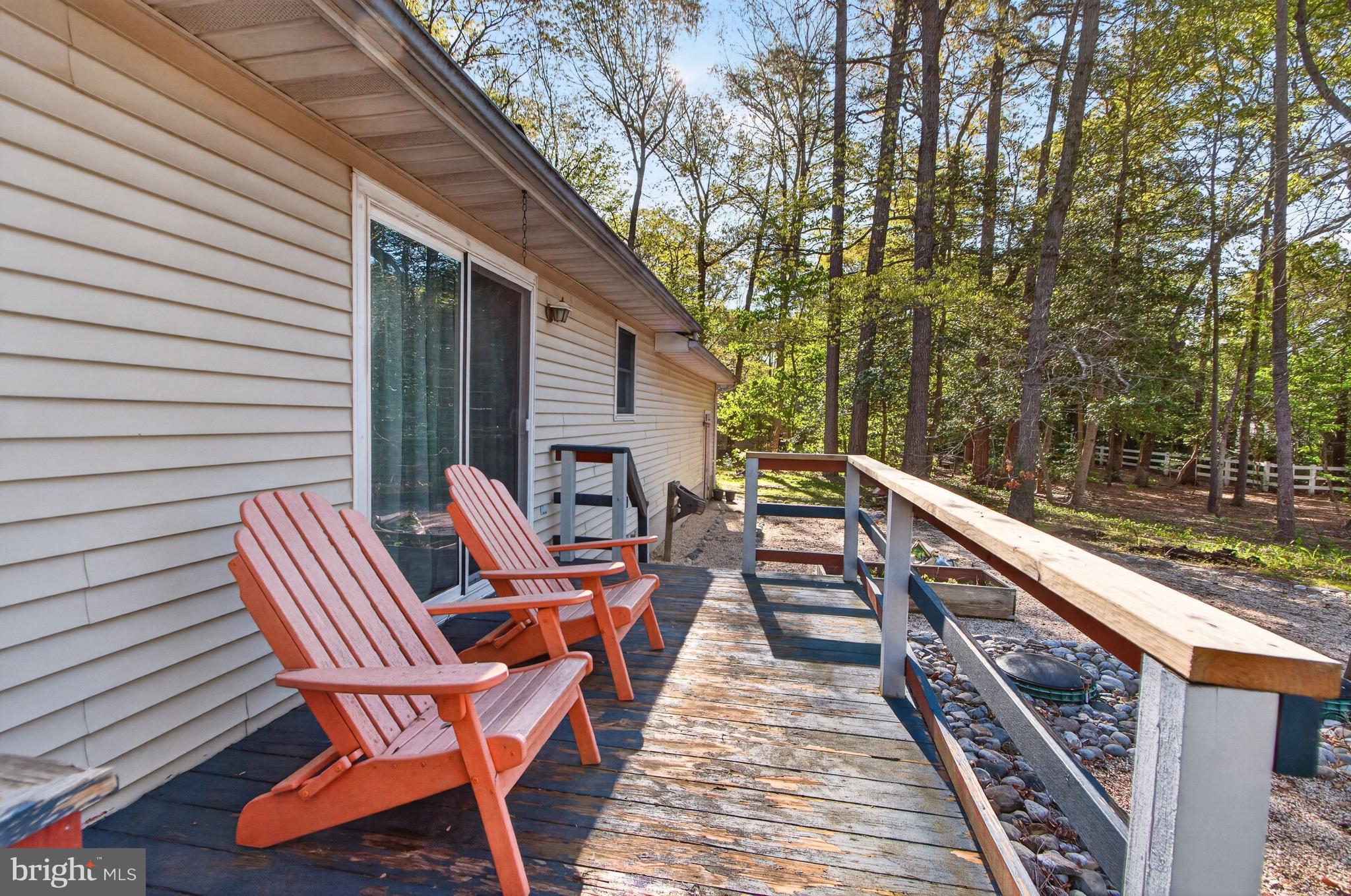 116 Red Cedar Drive Milton, DE 19968 - Photo 32 of 44 a balcony with chairs