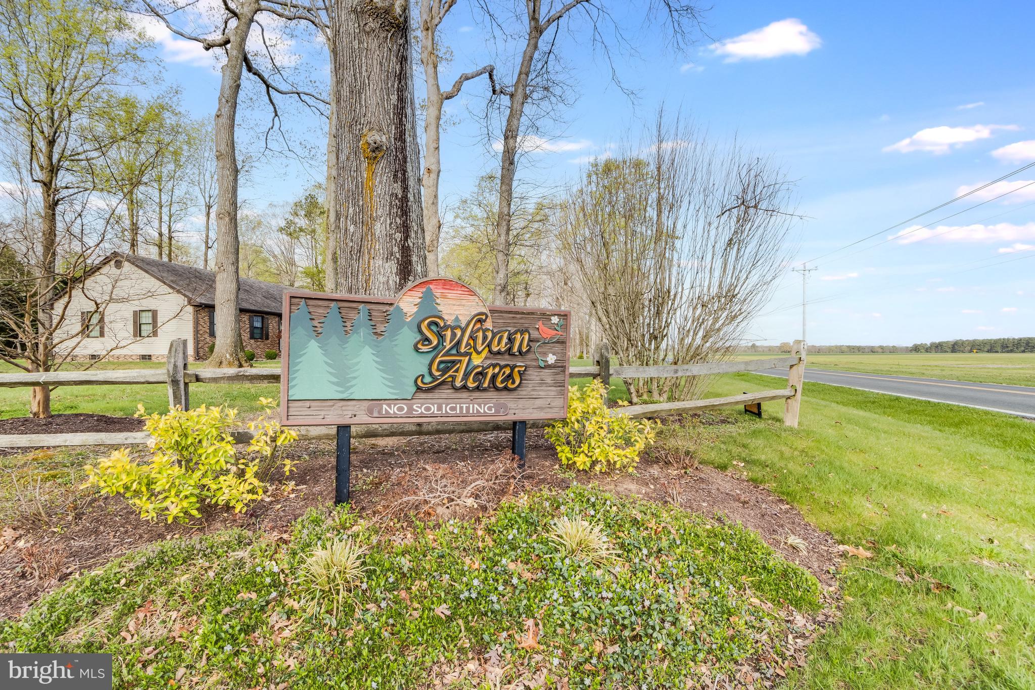 116 Red Cedar Drive Milton, DE 19968 - Photo 43 of 44 a view of outdoor space with sign board