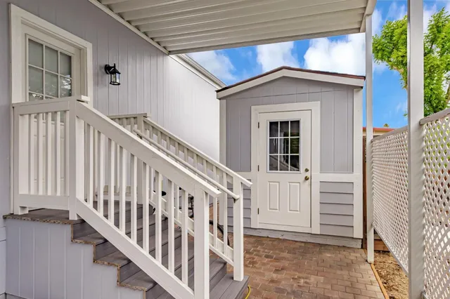 a view of a garage with wooden wall