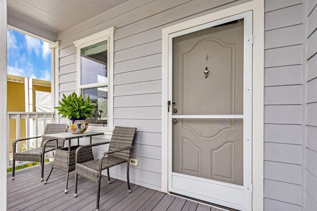 a view of porch with seating space