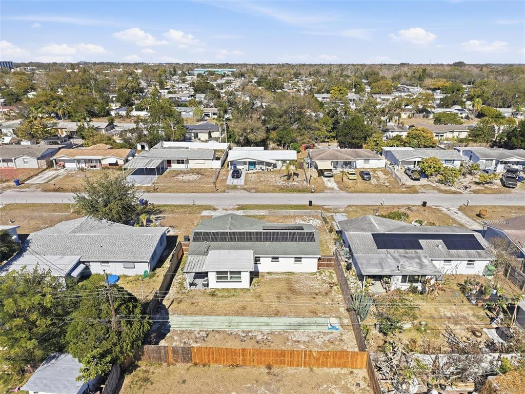 4750 Foothill Drive Holiday, FL 34690 - Photo 36 of 38 an aerial view of residential houses with outdoor space