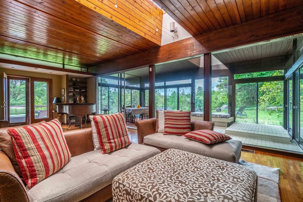 67 Conant Road Lincoln, MA 01773 - Photo 13 of 38 a living room with furniture and a large window